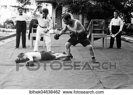 Lilliputian at boxing, one goes KO, 1930, 1930s, exact place unknown, Germany, Europe View Large Photo Image Stock Image - Lilliputian at boxing, one goes KO, 1930, 1930s, exact place unknown, Germany, Europe. Fotosearch