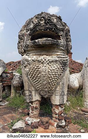 Lion figure at the Chedi of Wat Thammikarat, Ayutthaya Historical Park, Ayutthaya, Thailand, Asia View Large Photo Image Stock Photo - Lion figure at the Chedi of Wat Thammikarat, Ayutthaya Historical Park, Ayutthaya, Thailand, Asia. Fotosearch