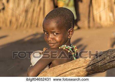 Little Girl of the Hamer tribe, portrait, Turmi, Region of the Southern Nations, Ethiopia, Africa View Large Photo Image Stock Image - Little Girl of the Hamer tribe, portrait, Turmi, Region of the Southern Nations, Ethiopia, Africa. Fotosearch