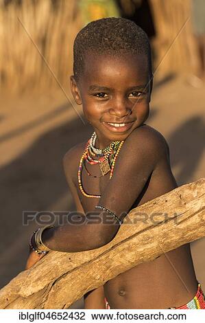 Stock Image - Little Girl of the Hamer tribe, portrait, Turmi, Region of the Southern Nations, Ethiopia, Africa. Fotosearch