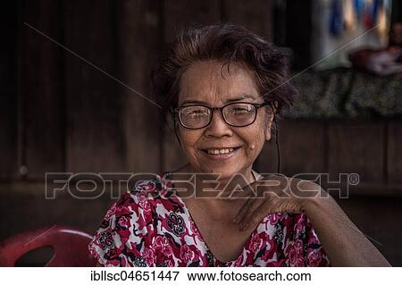 Local woman, Portrait, laughing, Village Preah Meas, Sen Monorom, Mondulkiri, Cambodia, Asia View Large Photo Image Stock Photo - Local woman, Portrait, laughing, Village Preah Meas, Sen Monorom, Mondulkiri, Cambodia, Asia. Fotosearch