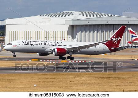 Stock Photo - London, 31 July 2018: A Virgin Atlantic Boeing 787-9 Dreamliner aircraft with registration mark G-VWOO lands at Heathrow Airport (LHR) in the United Kingdom, United Kingdom, Europe. Fotosearch