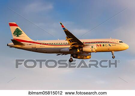 Stock Image - London, 31 July 2018: An Airbus A320 of MEA Middle East Airlines with registration mark T7-MRE lands at Heathrow Airport (LHR) in the United Kingdom, United Kingdom, Europe. Fotosearch