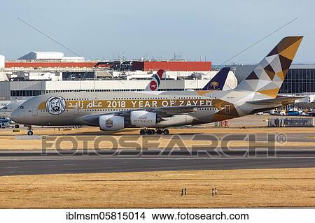 Picture - London, August 1, 2018: An Etihad Airbus A380-800 with registration mark A6-APH and special painting 2018 Year of Zayed at Heathrow Airport (LHR) in the United Kingdom, United Kingdom, Europe. Fotosearch