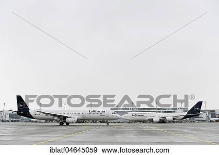 Lufthansa New Livery, New Lufthansa Branding, Boeing B747-800 and Airbus A321, Munich Airport, Upper Bavaria, Germany, Europe View Large Photo Image Stock Photo - Lufthansa New Livery, New Lufthansa Branding, Boeing B747-800 and Airbus A321, Munich Airport, Upper Bavaria, Germany, Europe. Fotosearch