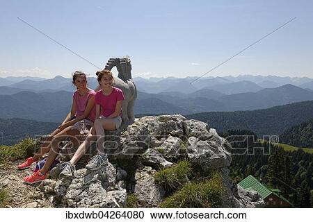 Madchen, Teenager rasten bei der Stie-Alm, Brauneck, bei Lenggries, Isarwinkel, Oberbayern, Bayern, Deutschland, Europa View Large Photo Image Stock Image - Madchen, Teenager rasten bei der Stie-Alm, Brauneck, bei Lenggries, Isarwinkel, Oberbayern, Bayern, Deutschland, Europa. Fotosearch