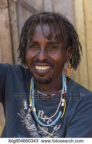 Man, ca 40 years, portrait, Hamer tribe, Turmi market, Southern Nations Nationalities and Peoples' Region, Ethiopia, Africa View Large Photo Image Stock Image - Man, ca 40 years, portrait, Hamer tribe, Turmi market, Southern Nations Nationalities and Peoples' Region, Ethiopia, Africa. Fotosearch