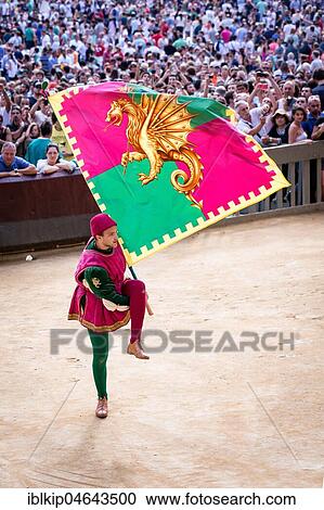 Man carrying a historical flag during the Corteo Storico parade before the Palio di Siena horse race, Siena, Tuscany, Italy, Europe View Large Photo Image Stock Image - Man carrying a historical flag during the Corteo Storico parade before the Palio di Siena horse race, Siena, Tuscany, Italy, Europe. Fotosearch