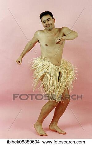 Man dances in a bast skirt, Berlin, Germany, Europe View Large Photo Image Picture - Man dances in a bast skirt, Berlin, Germany, Europe. Fotosearch