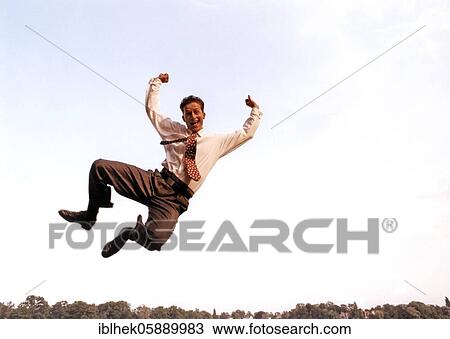 Man jumps in the air, businessman, joy, good mood, Berlin, Germany, Europe View Large Photo Image Stock Image - Man jumps in the air, businessman, joy, good mood, Berlin, Germany, Europe. Fotosearch