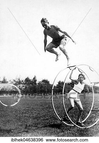 Man jumps over gymwheel, 1934, 1930s, exact place unknown, Germany, Europe View Large Photo Image Stock Photograph - Man jumps over gymwheel, 1934, 1930s, exact place unknown, Germany, Europe. Fotosearch