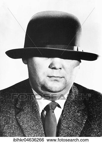Stock Photograph - Man with hat over his eyes, ca. 1960s, Berlin, Germany, Europe. Fotosearch
