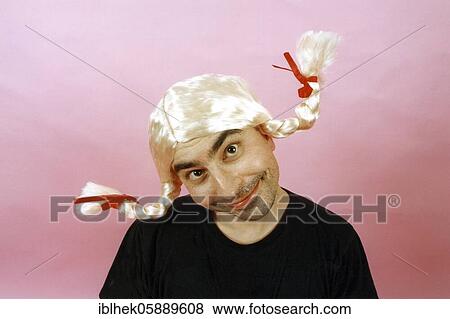 Stock Photo - Man with plaited wig, Berlin, Germany, Europe. Fotosearch
