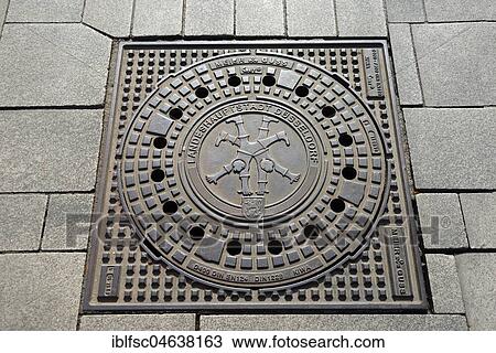 Stock Image - Manhole cover, Düsseldorf, North Rhine-Westphalia, Germany, Europe. Fotosearch