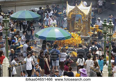 Many people at the Erawan Shrine with Hindu-God Brahma, Ratchaprasong crossing of Phloen-Chit- and Ratchadamri-Street, Pathum Wan, Bangkok, Thailand, Asia View Large Photo Image Stock Photograph - Many people at the Erawan Shrine with Hindu-God Brahma, Ratchaprasong crossing of Phloen-Chit- and Ratchadamri-Street, Pathum Wan, Bangkok, Thailand, Asia. Fotosearch
