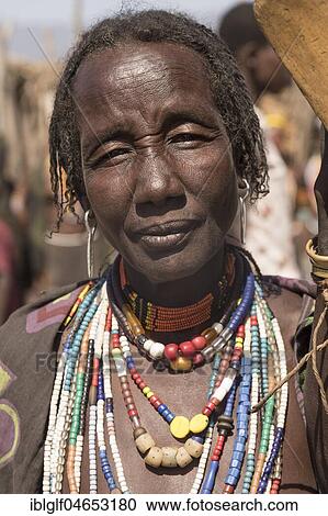 Stock Image - Married elderly woman from Arbore tribe, portrait, Turmi, Ethiopia, Africa. Fotosearch