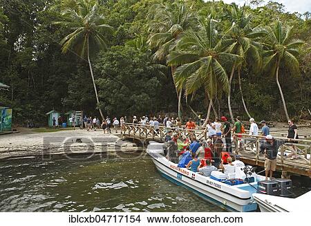 Picture - Masses of people arriving on a Cayo or rock island, Los Haitises National Park, Samaná Province, Dominican Republic, Central America. Fotosearch