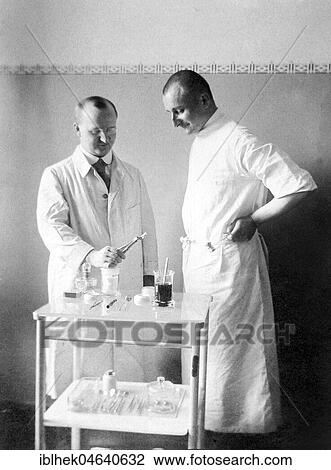 Stock Image - Medicine, health, two dentists, ca. 1930s, exact location unknown, Germany, Europe. Fotosearch