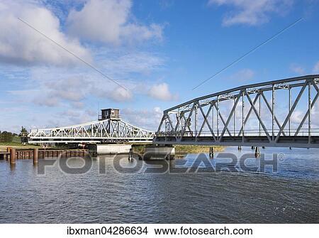 Meiningenbrucke uber Meiningenstrom, Drehbrucke, Fischland-Darss-Zingst, Nationalpark Vorpommersche Boddenlandschaft, Mecklenburg-Vorpommern, Deutschland, Europa View Large Photo Image Picture - Meiningenbrucke uber Meiningenstrom, Drehbrucke, Fischland-Darss-Zingst, Nationalpark Vorpommersche Boddenlandschaft, Mecklenburg-Vorpommern, Deutschland, Europa. Fotosearch