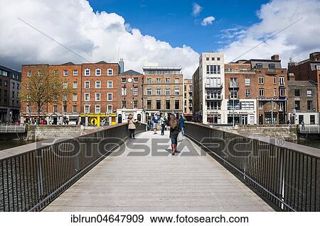 Stock Photo - Millenium bridge above the River Liffey, Dublin, Ireland, Europe. Fotosearch