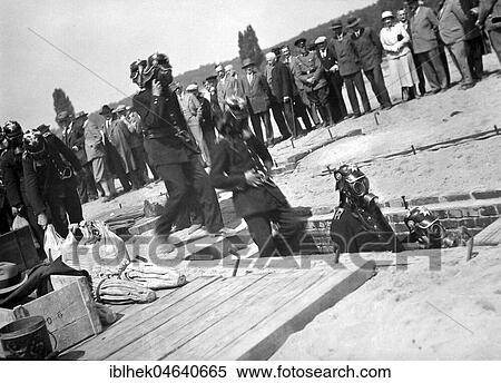 Stock Photography - Mining, rescue from a mine with gas masks and recirculation device, ca. 1940s, exact location unknown, Germany, Europe. Fotosearch