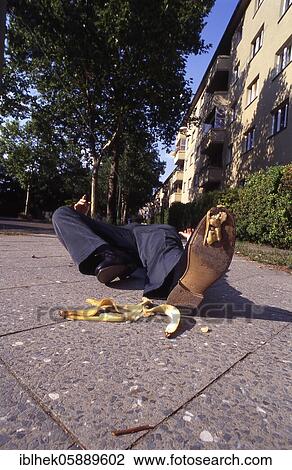 Misfortune, man slips on banana peel, Berlin, Germany, Europe View Large Photo Image Stock Image - Misfortune, man slips on banana peel, Berlin, Germany, Europe. Fotosearch