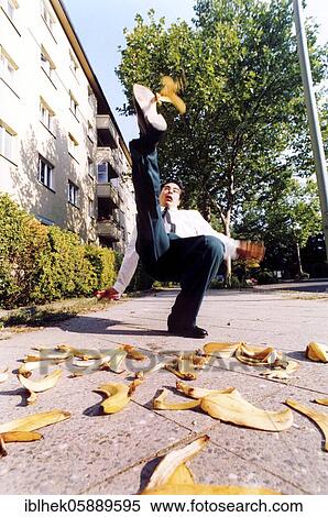 Misfortune, man slips on banana peel, Berlin, Germany, Europe View Large Photo Image Stock Photography - Misfortune, man slips on banana peel, Berlin, Germany, Europe. Fotosearch