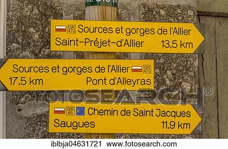 Stock Image - Monistrol d'Allier village, Road signs, Camino de Santiago, Haute-Loire department, Auvergne-Rhône-Alpes, France, Europe. Fotosearch