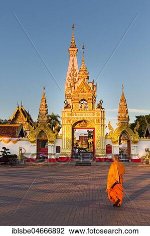 Monk in front of Chedi of Wat Phra That Phanom, temple complex in Amphoe That Phanom, province Nakhon Phanom, Isan, Thailand, Asia View Large Photo Image Stock Image - Monk in front of Chedi of Wat Phra That Phanom, temple complex in Amphoe That Phanom, province Nakhon Phanom, Isan, Thailand, Asia. Fotosearch