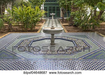 Stock Photo - Mosaic floor with fountain, palace of Bahia, Marrakech, Morocco, Africa. Fotosearch