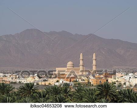 Mosque with minaret, palm oasis, in the back Al Hajar Mountains, Nakhl, Oman, Asia View Large Photo Image Stock Photo - Mosque with minaret, palm oasis, in the back Al Hajar Mountains, Nakhl, Oman, Asia. Fotosearch