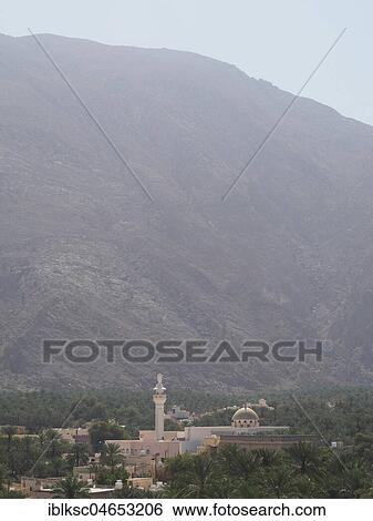 Mosque with minaret, palm oasis, in the back Al Hajar Mountains, Nakhl, Oman, Asia View Large Photo Image Stock Photograph - Mosque with minaret, palm oasis, in the back Al Hajar Mountains, Nakhl, Oman, Asia. Fotosearch