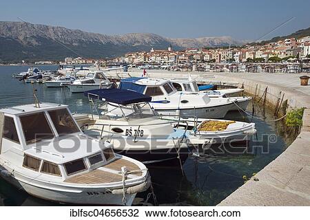 Stock Image - Motor boats in the harbour, Baska, island Krk, Kvarner Gulf Bay, Croatia, Europe. Fotosearch