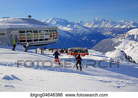 Stock Photograph - Mountain restaurant at the skiing area on the Bettmerhorn, in the back Dom 4545m, Matterhorn 4478m and Weisshorn 4505m, Bettmeralp, Aletsch area, Upper Valais, Valais, Switzerland, Europe. Fotosearch
