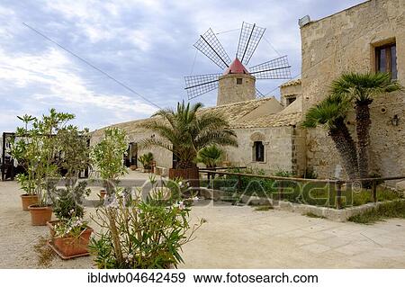Museo del Sale, Salt Museum with Windmill, saltworks Culcasi, Via del Sale, Salt Road, Nubia, Province of Trapani, Sicily, Italy, Europe View Large Photo Image Stock Photo - Museo del Sale, Salt Museum with Windmill, saltworks Culcasi, Via del Sale, Salt Road, Nubia, Province of Trapani, Sicily, Italy, Europe. Fotosearch