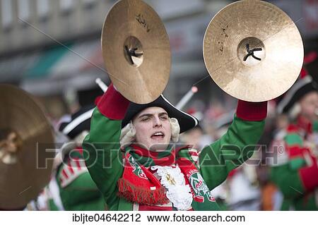 Musician of a brass band with cymbals in uniform, Carnival Monday procession, Cologne, North Rhine-Westphalia, Germany, Europe View Large Photo Image Stock Image - Musician of a brass band with cymbals in uniform, Carnival Monday procession, Cologne, North Rhine-Westphalia, Germany, Europe. Fotosearch