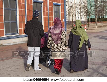 Picture - Muslim family with pram. Fotosearch