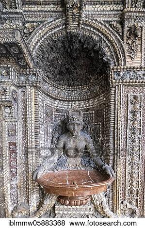 Stock Photo - Mythical fountain figure, fountain, decorated with shells, Grottenhof, Munich Residence, Munich, Upper Bavaria, Bavaria, Germany, Europe. Fotosearch