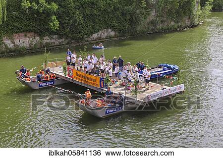 Stock Photograph - Nabada, event on Schwörmontag, boat, watercraft of the fire brigades, THW, people on the Danube, chapel, Ulm, Baden-Württemberg, Germany, Europe. Fotosearch