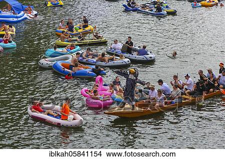 Picture - Nabada, event on Schwörmontag, boats, water vehicles, people on the Danube, Ulm, Baden-Württemberg, Germany, Europe. Fotosearch