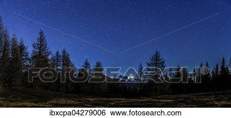 Nachtaufnahme mit Sternen, vorne Almwiesen und Baume, hinten Berge, Gleinser Berg, Tirol, Osterreich, Europa View Large Photo Image Stock Photograph - Nachtaufnahme mit Sternen, vorne Almwiesen und Baume, hinten Berge, Gleinser Berg, Tirol, Osterreich, Europa. Fotosearch