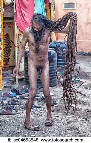 Naked Sadhu with long hair during Hindu festival Kumbh Mela, Ujjain, India, Asia View Large Photo Image Stock Photo - Naked Sadhu with long hair during Hindu festival Kumbh Mela, Ujjain, India, Asia. Fotosearch