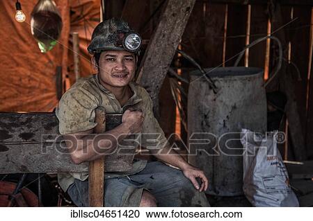 Native with headlamp on the illegal search for gold in mines, Preah Meas, Sen Monorom, Mondulkiri, Cambodia, Asia View Large Photo Image Stock Image - Native with headlamp on the illegal search for gold in mines, Preah Meas, Sen Monorom, Mondulkiri, Cambodia, Asia. Fotosearch