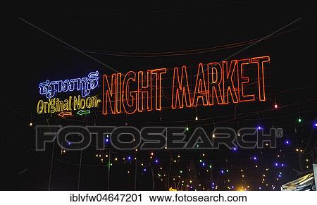 Stock Image - Neon lights, lettering Nightmarket, Pub Street by night, Nightlife, Siem Reap, Angkor, Cambodia, Asia. Fotosearch