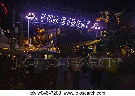 Stock Image - Neon lights, lettering Nightmarket, Pub Street by night, Nightlife, Siem Reap, Angkor, Cambodia, Asia. Fotosearch