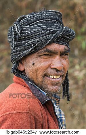 Nepalese man wearing a scarf, portrait, Dhampus Mountain village, Nepal, Asia View Large Photo Image Stock Photo - Nepalese man wearing a scarf, portrait, Dhampus Mountain village, Nepal, Asia. Fotosearch