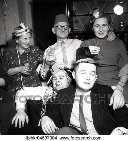 New Year's Eve party, 1950s, ca. 1959, exact place unknown, Germany, Europe View Large Photo Image Picture - New Year's Eve party, 1950s, ca. 1959, exact place unknown, Germany, Europe. Fotosearch