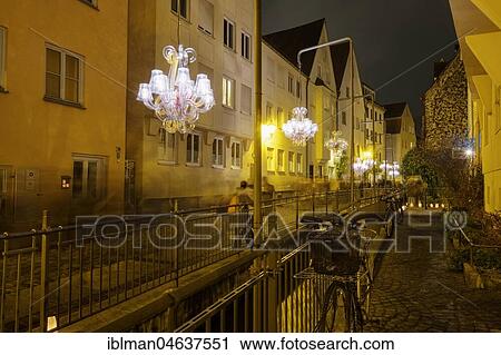 Stock Image - Night of 1000 lights, chandelier over Middle Lech, Lechviertel, Augsburg, Swabia, Bavaria, Germany, Europe. Fotosearch