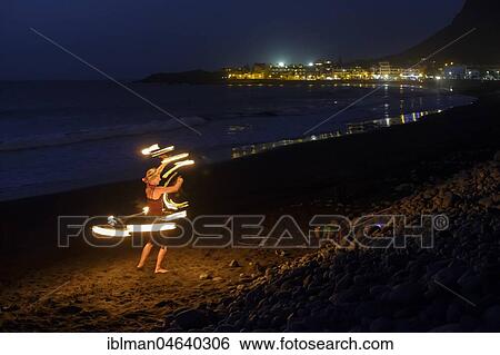 Night shot, fire dance, dance with torches on the beach, La Playa, Valle Gran Rey, La Gomera, Canary Islands, Spain, Europe View Large Photo Image Stock Photograph - Night shot, fire dance, dance with torches on the beach, La Playa, Valle Gran Rey, La Gomera, Canary Islands, Spain, Europe. Fotosearch