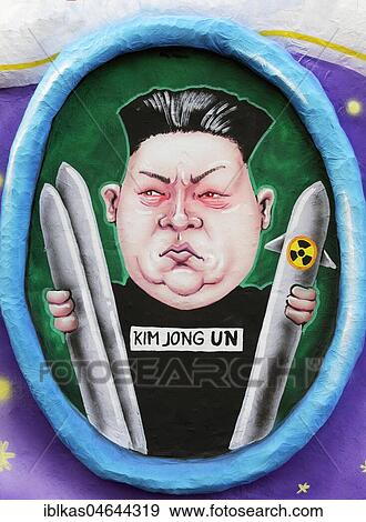 North Vietnamese President Kim Jong-un holds nuclear missile, political caricature, motto caravan during Carnival Monday procession 2018, Düsseldorf, North Rhine-Westphalia, Germany, Europe View Large Photo Image Stock Photo - North Vietnamese President Kim Jong-un holds nuclear missile, political caricature, motto caravan during Carnival Monday procession 2018, Düsseldorf, North Rhine-Westphalia, Germany, Europe. Fotosearch
